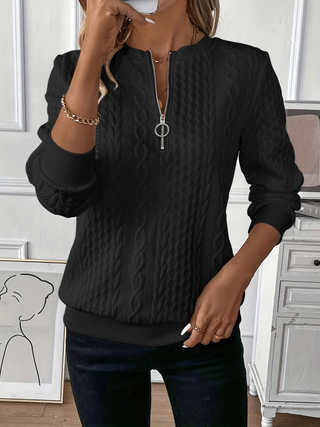 Amala | Zip-up cable knit sweater
